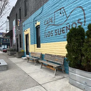 a blue and yellow painted building