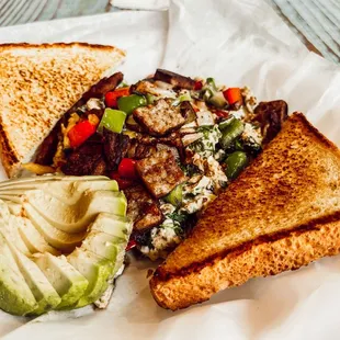 Our signature Egg Boat with all of the yummy ingredients for the perfect breakfast bowl!