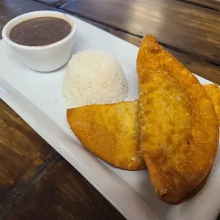 Beef, Chicken, Veggie, or Tuna Empanada with the best Black beans in town