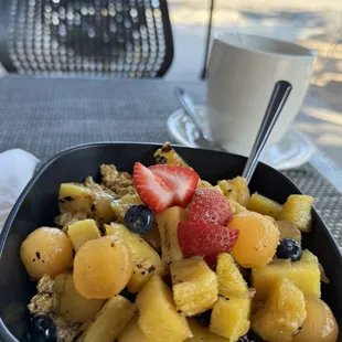 Yogurt, granola and fruit.