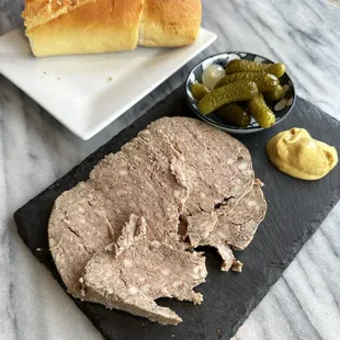 Pate with cornichons, mustard and bread