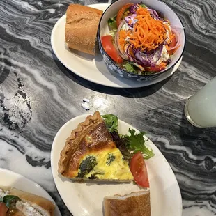 two plates of food on a marble table