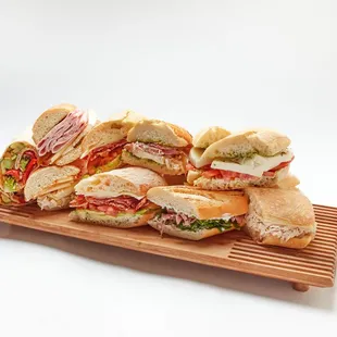 a plate of sandwiches on a white background