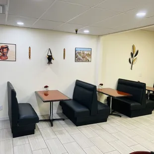tables and chairs in a waiting area