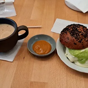 Egg sausage sandwich with latte..