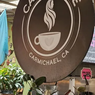 a sign for a coffee shop