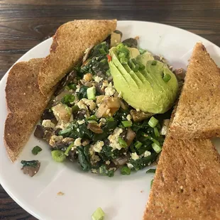 Mushroom, tofu, spinach and vegetable scramble with toast Vegan