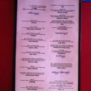 a menu on a red table