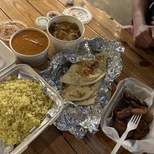 Dinner for 2, Left to right- Yellow rice, butter chicken, Eggplant tikka korma, Naan bread, Eggplant pakora
