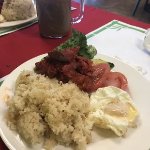 Tapsilog was just watery and bland. Not sweet or salty just tasted like boiled red meat.
