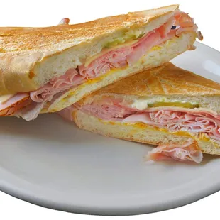 King 12" Cuban made with fresh Cuban bread, quality baked ham, genoa salami, imported Swiss cheese, Cuban style pork (fresh from our kitchen