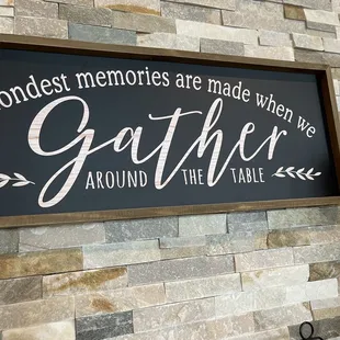 a picture of a sign that says, the greatest memories are made when we gather around the table