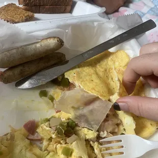 a plate of food with a knife and fork
