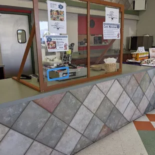 a counter with a checkered floor