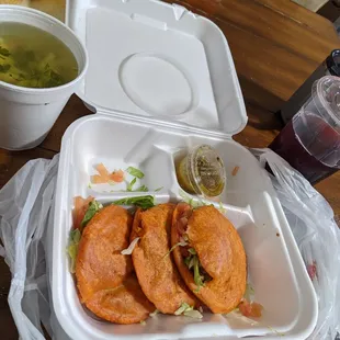 a sandwich in a styrofoam container