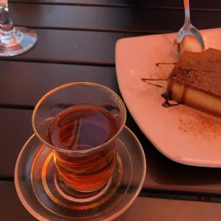 a piece of chocolate cake and a cup of tea