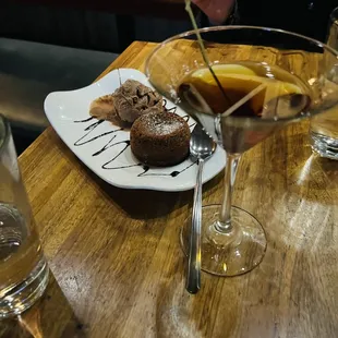 My GF enjoying her vice of choice (chocolate lava cake), me enjoying mine (liquor)