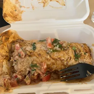 a meal in a styrofoam container