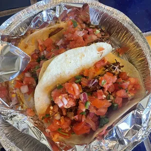 My tacos without lettuce and the "normal" amount of pico de Gallo.