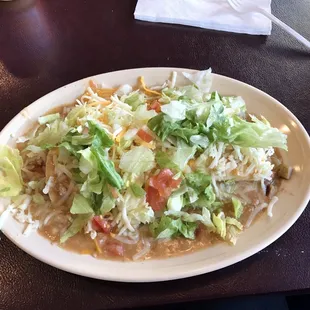 Smothered breakfast burrito with steak. Chili is hot but no flavor.