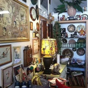 a room full of antiques and art