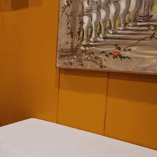 a white table with a white tablecloth