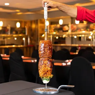 12 different types of meat which are presented on skewers and carved table side. www.cafemineirosteakhouse.com