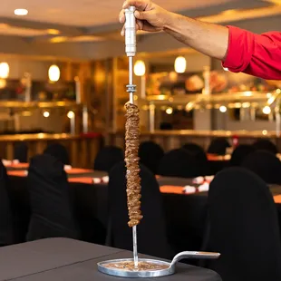12 different types of meat which are presented on skewers and carved table side. www.cafemineirosteakhouse.com