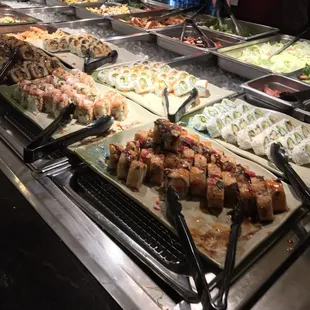 a buffet with many different types of food