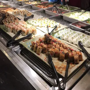 a buffet with a variety of food items