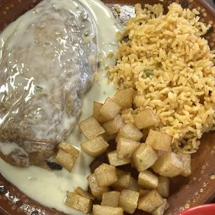 Chili relleno with potatoes and rice