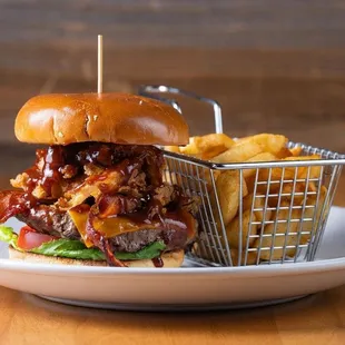 a burger and fries on a plate