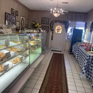 Bakery offerings including bread and pantry items like jelly