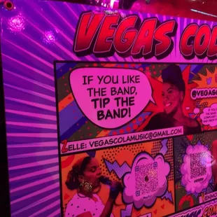 a sign advertising a band