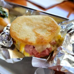 Ham, egg, and cheese arepa