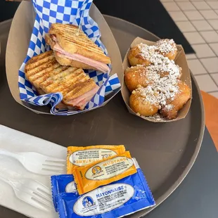 Turkey and Swiss sandwich  Fresh cooked Traditional Greek Donuts