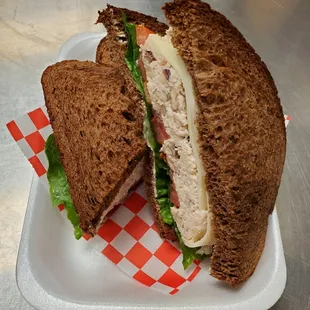 a cut in half sandwich on a plate