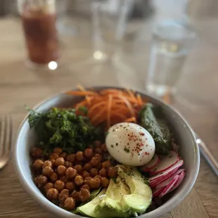 quinoa bowl, poached egg, quinoa, fried chickpeas, avocado, hearty greens, almond pesto