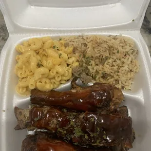 2 Meats with 2 Sides (Bbq pork ribs &amp; bbq chicken legs with dirty rice and macaroni and cheese)