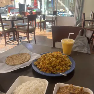 Rice jackfruit curry, kothu roti, parotta and a mango lassi.