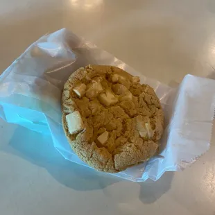 a cookie and a napkin on a table