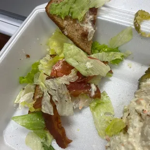 One slice of bacon split in two.