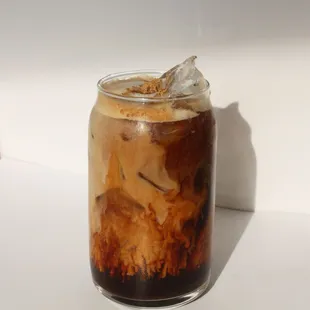 a cold beverage in a glass jar