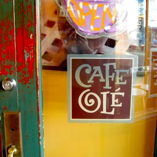 a cup of coffee in a window