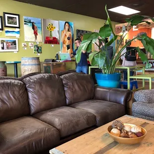 Comfy seating options, wall art, nice eclectic decor.
