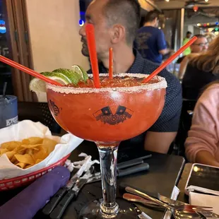 a margarita with a salted rim and garnish
