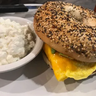 a bagel sandwich with egg and cheese