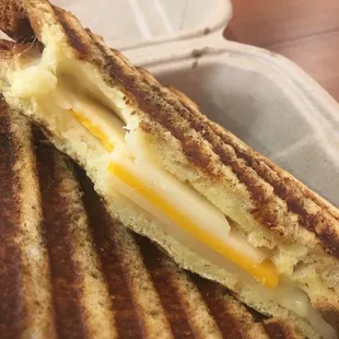 "Three cheese panini" from the grill. The cheese isn't even melted.