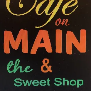 the sign for the sweet shop and bakery