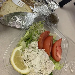 a salad in a plastic container